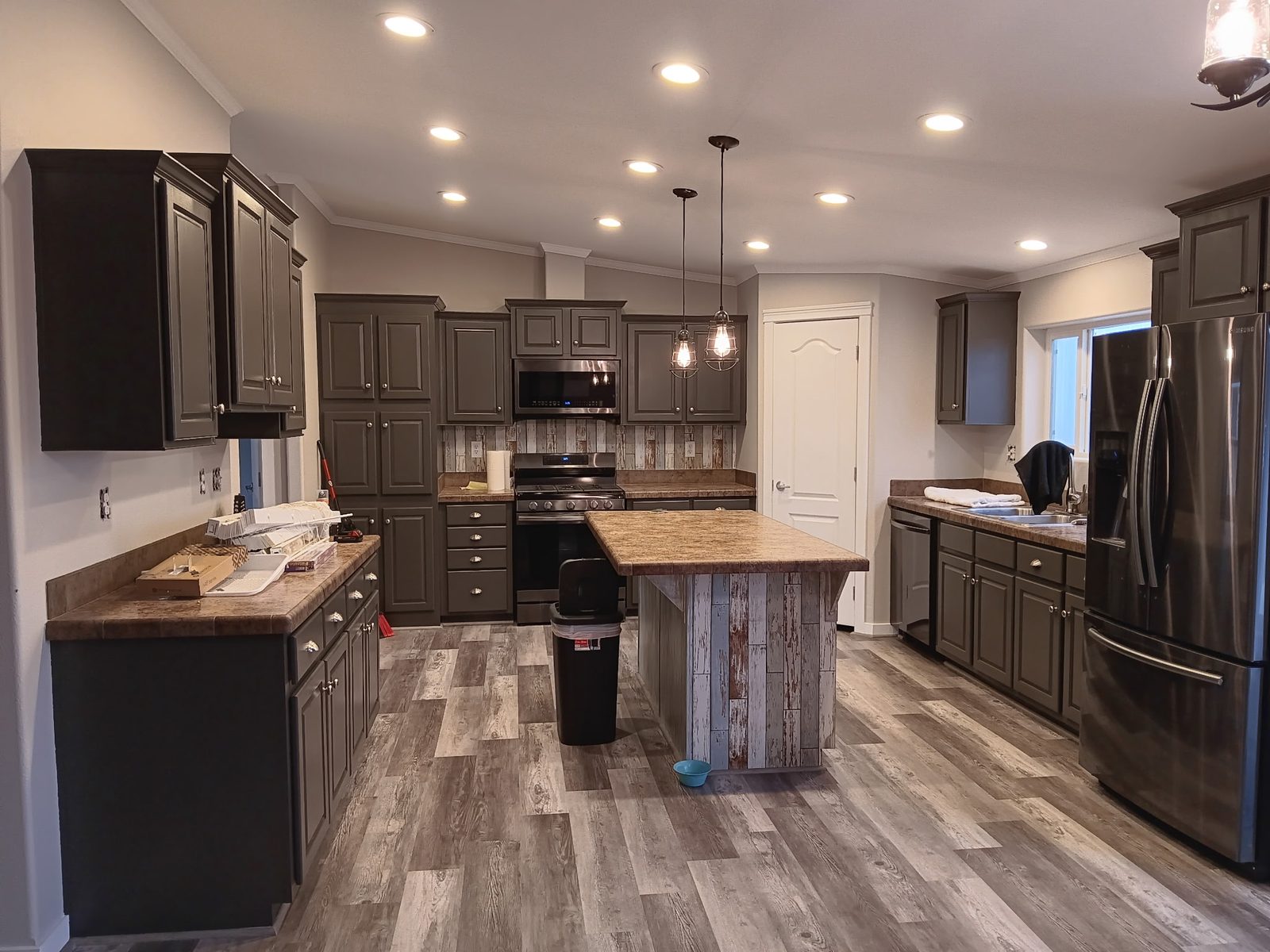 Grey painted kitchen island in a Utah home