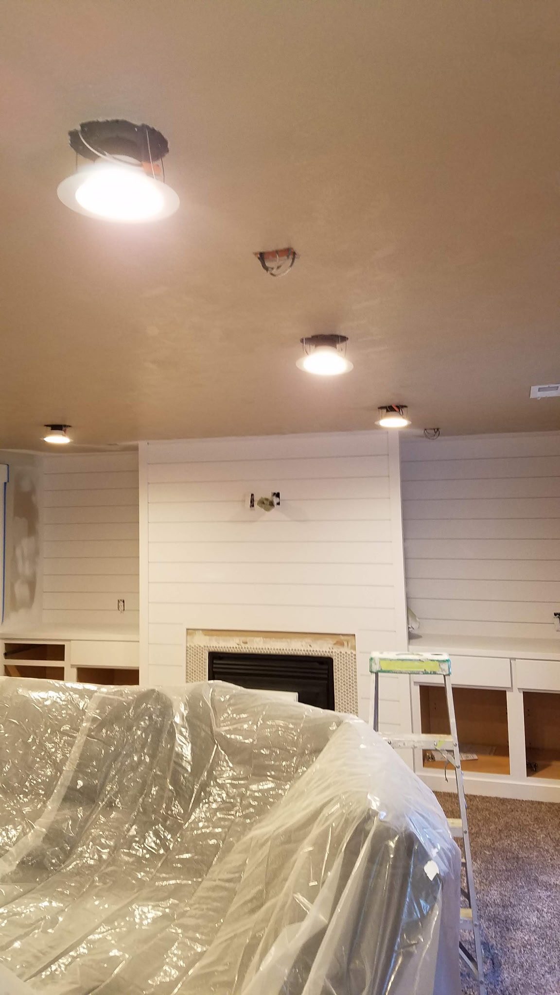 White staged kitchen after cabinet painting in Utah