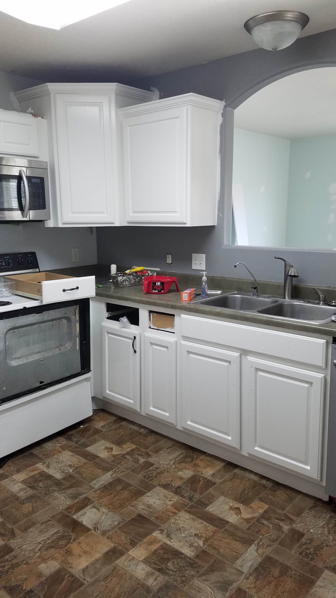 White refinished kitchen cabinets in Utah