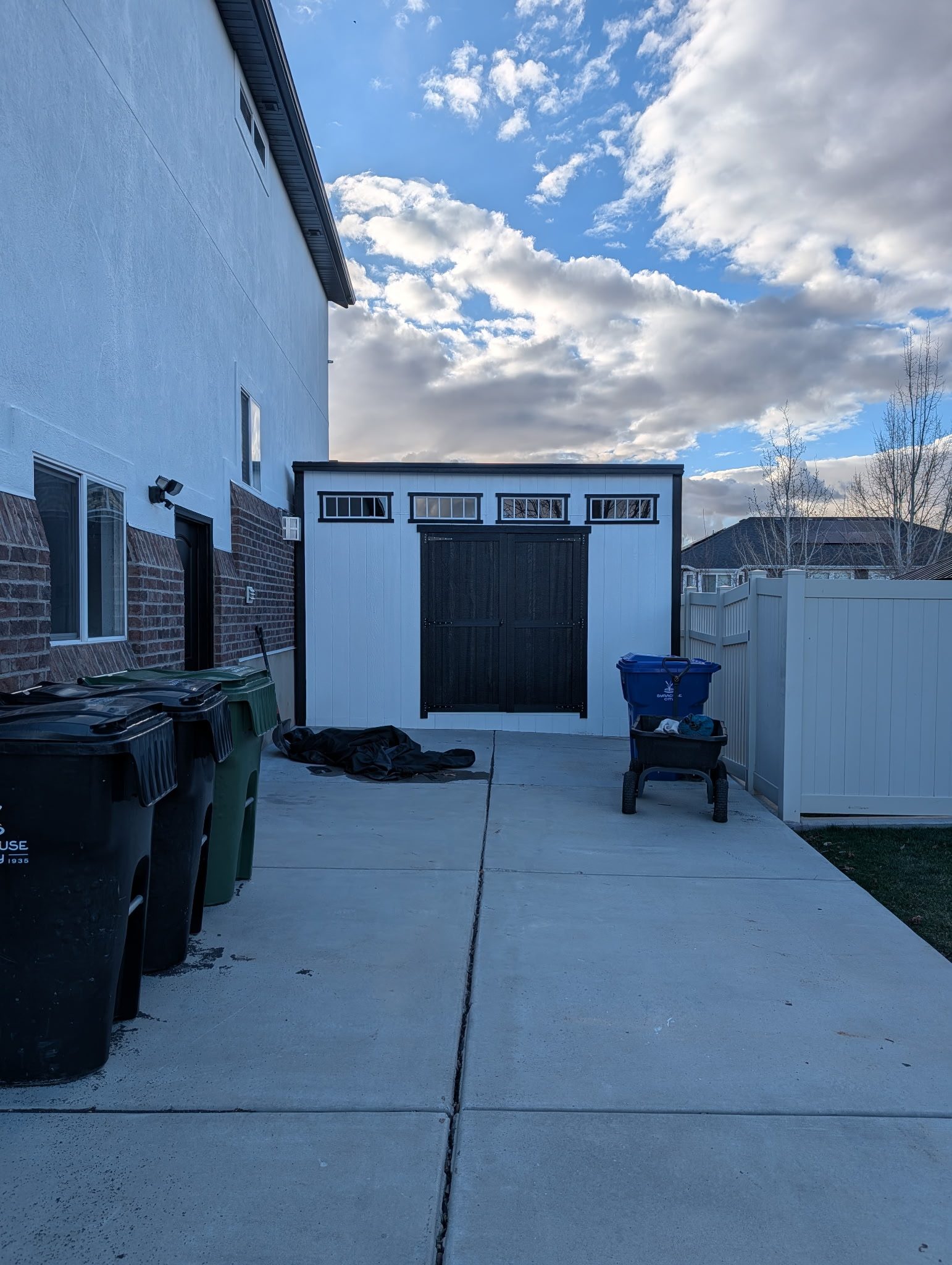 White board-and-batten shed exterior paint in Utah
