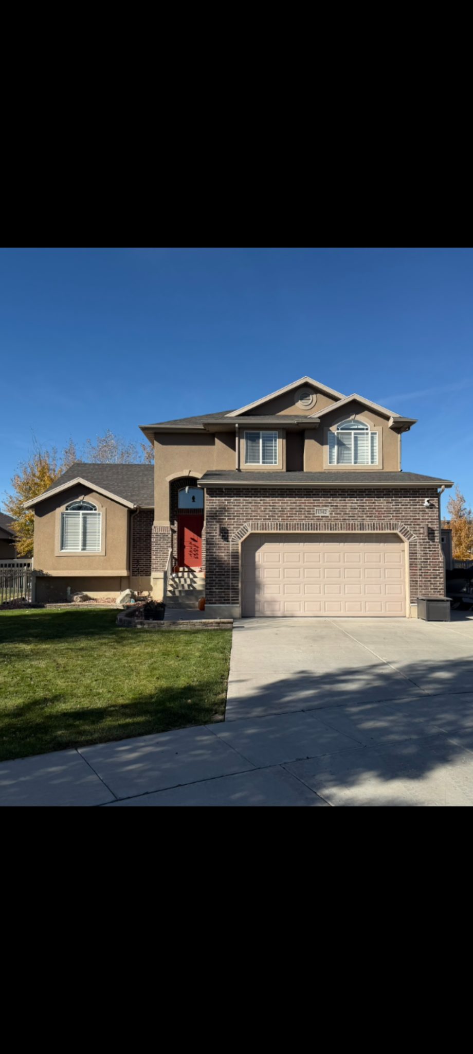 Freshly painted two-story Utah home exterior