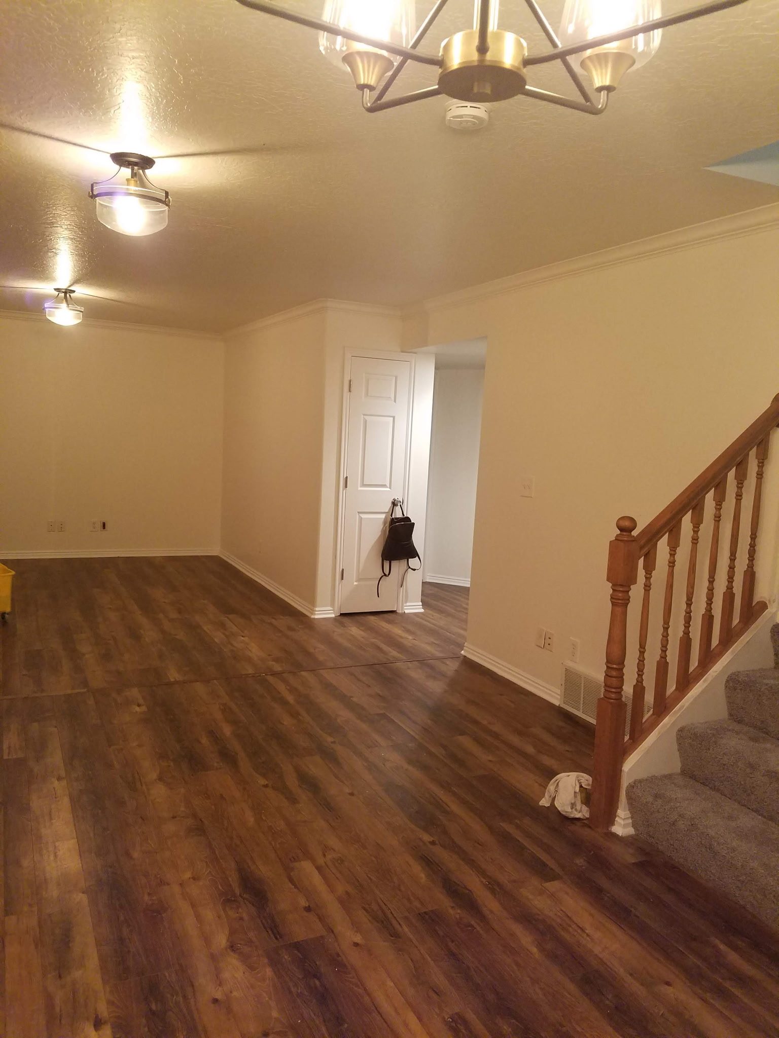Entryway with hardwood floors and fresh paint in a Utah home