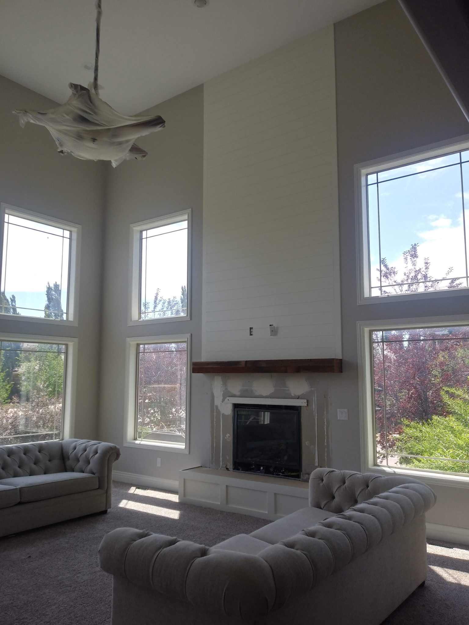 Modern living room with painted fireplace wall in Utah